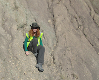 Geologist Coming Down A Mountain